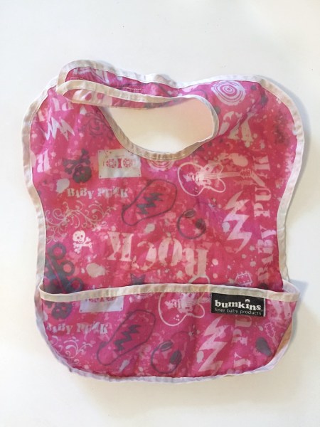 Bumkins bib with pocket and velcro in pink rocker print