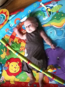 Infant watching toys on Tiny Love Monkey Island Gymini activity gym mat