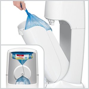 Emptying a full bag of diapers from the newest Diaper Genie disposable diaper pail
