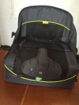 Brica Fold N Go Travel Booster Seat shown unfolded on the floor