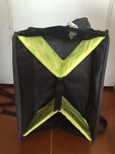 Support underneath a Brica Fold N Go travel booster seat unfolded