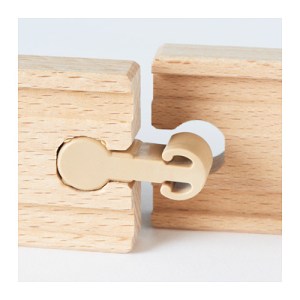 You don't need any tools to push the plastic connectors into the wooden track. IKEA Lillabo wooden track close up of plastic track connectors inserted in wooden pieces