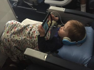 Two and a half year old lying down with the use of a JetKids BedBox