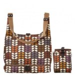 Orla Kiely baby bag diaper midi sling style in multi directional stem print with matching changing mat