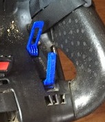 Close up of a convertible car seat lock off open