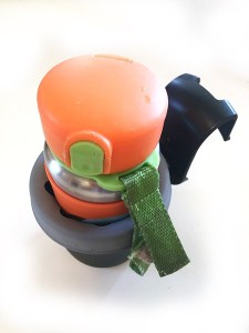 Skip Hop stainless steel water bottle inside a Britax convertible car seat removable cup holder