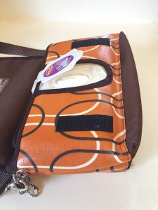 Reese Li changing clutch shown open with wipes container accessible