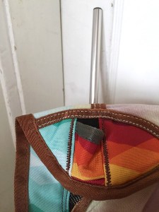 Cuff on canvas of Alite designs mayfly chair that fits over pole shown in background