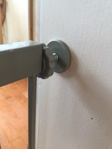 Pressure mount on summer infant step to open baby gate gray