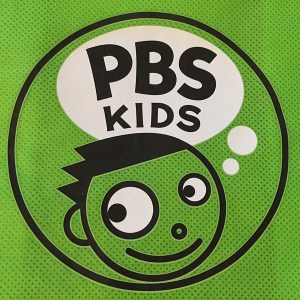 PBS Kids logo with child head and PBS in thought bubble with kids pointing up at it on blue background