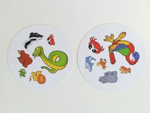 Two Spot It Jr animal edition cards laid side by side