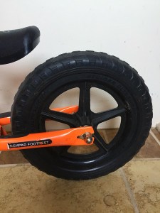 Strider balance bike launchpad footrest close up