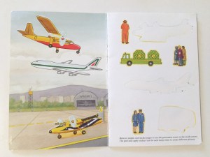 Dover Little Airport Sticker Activity book open to printed scene and sticker page
