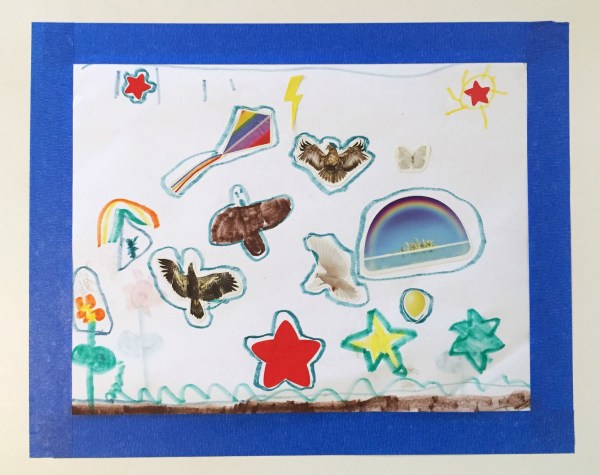 Child's art framed with blue painter's tape