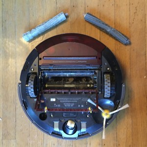 Roomba upside down with cleaning brushes removed