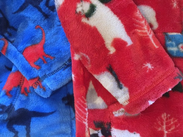 Brand new Hatley fleece next to year old fleece worn multiple times per week