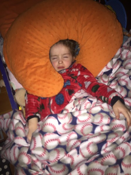 Toddler sleeping in Hatley fuzzy fleece jacket