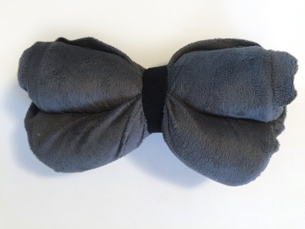 Foam contour pillow rolled up and held with Velcro tape