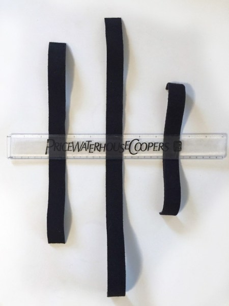 Strips of Velcro tape laid out with ruler across them