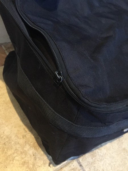 Close up of zipper on car seat travel bag