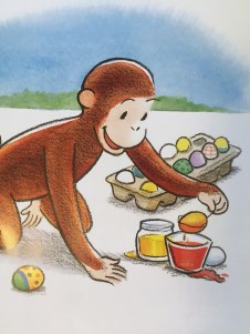 Curious George monkey dying Easter eggs from Happy Easter book