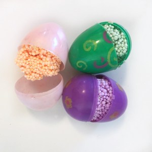 Three plastic Easter eggs filled with different colors of Playfoam
