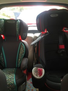 Graco Turbobooster and Nautilus highback booster seats installed in third row of Mazda Mazda5