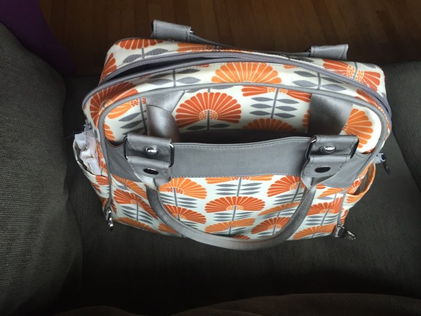 Backpack straps on Petunia PIcklebottom Sashay Satchel tucked into pocket