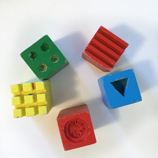 Wooden cube designs for use with modeling clay and play dough