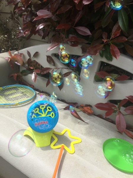 Fubbles bubble blasting machine blowing bubbles outdoors