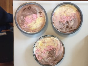 Neopolitan vanilla chocolate strawberry ice cream in three cake layer pans