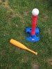 Little Tikes T-Ball set with orange bat, white oversized baseball, and blue and red tee