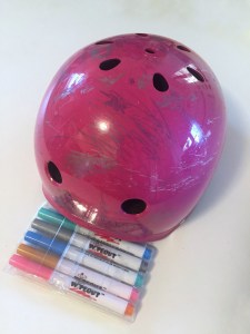 Wipeout helmet with five dry erase markers