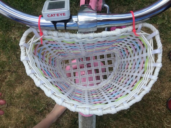 Inside view looking down into light up bike basket on girls bike