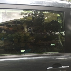 Sliding door of minivan with car cling shade installed