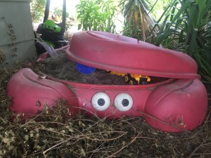 Step2 Crab sandbox partially opened with toys inside