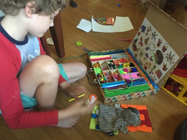 Kid Made Modern art kit crazy crafts case with child creating things