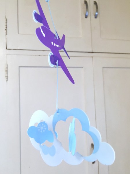 Djeco mobile purple airplane with clouds hanging