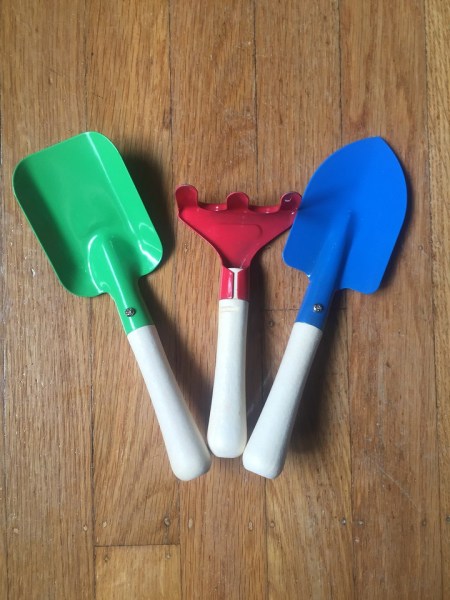Toysmith green shovel, red rake, and blue trowel with wooden handles