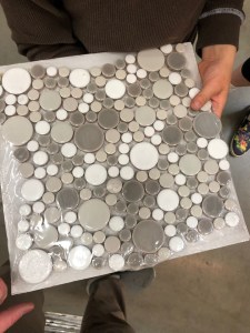 Tile sample of round gray and white circles in various sizes