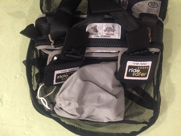 Ride Safer Harness packed into included backpack