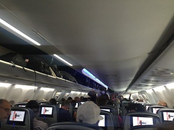 Overhead bins on board airplane