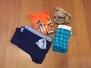 Preschooler spare clothes for school laid out folded