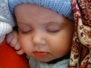 Baby sleeping in ring sling