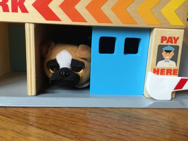 Beanie Boo dog Ty peeking out from blue garage door in Melissa Dough Service Station Parking Garage play set