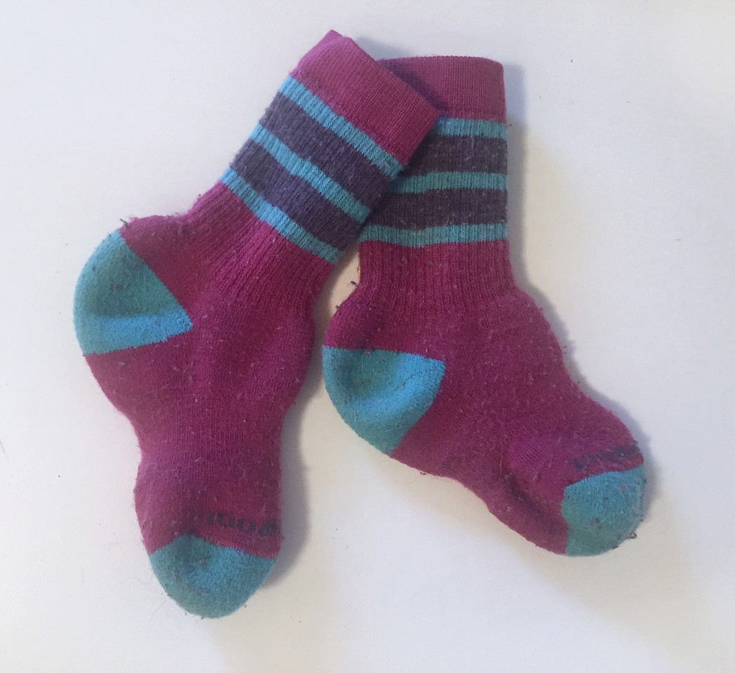 Smartwool toddler wool insulating socks in pink with blue stripes, toe, and heel