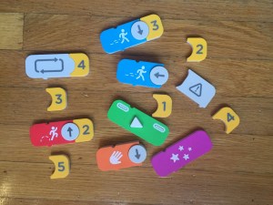 Osmo Coding Awbie code block pieces on floor