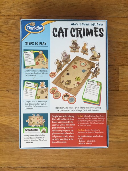 Cat Crimes back of game box showing board layout and characters