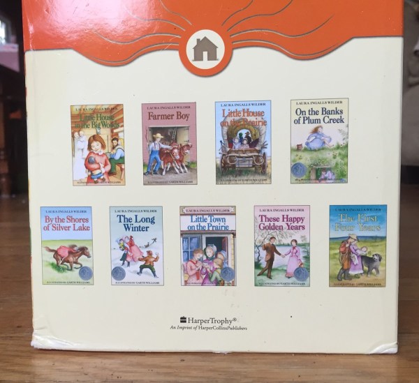 Side of box containing nine volume set of Little House on the Prairie series books by Laura Ingalls Wilder