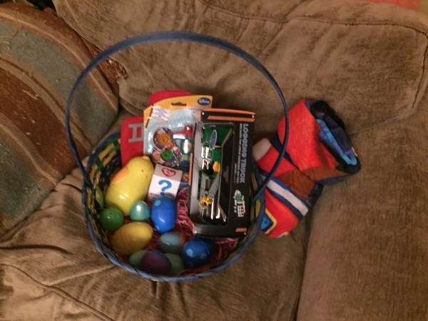 Easter basket filled with easter eggs, beanie boos, Driven truck, and more